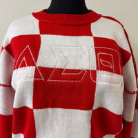 Delta Checkered Sweater