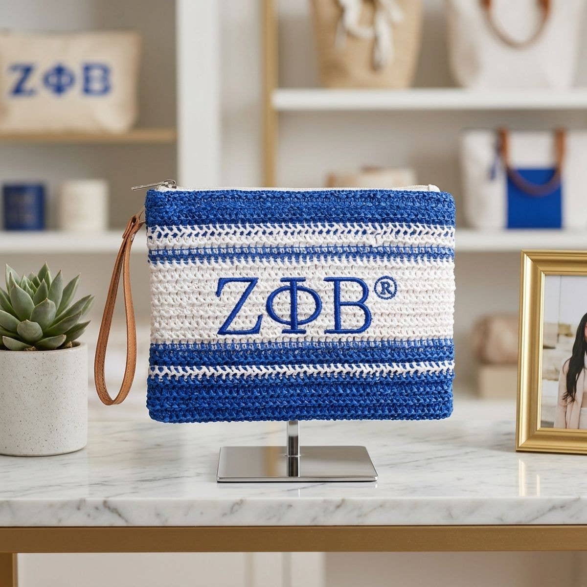 Zeta Embroidered Pouch Bag