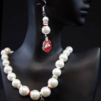 Delta Pearl Earrings with Shield Charm