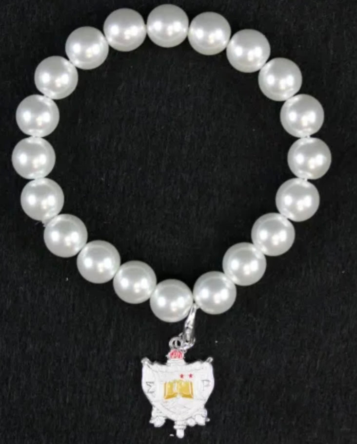 SGRho Pearls with Shield Charm Bracelet